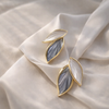 Ethereal Marble Leaf Studs – Gold-Edged Slate & Pearl Enamel Earrings